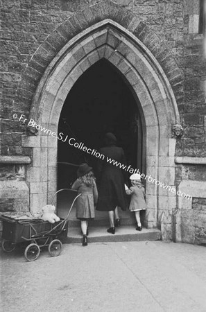 MARY CUNNINGHAM ENTERING CHURCH